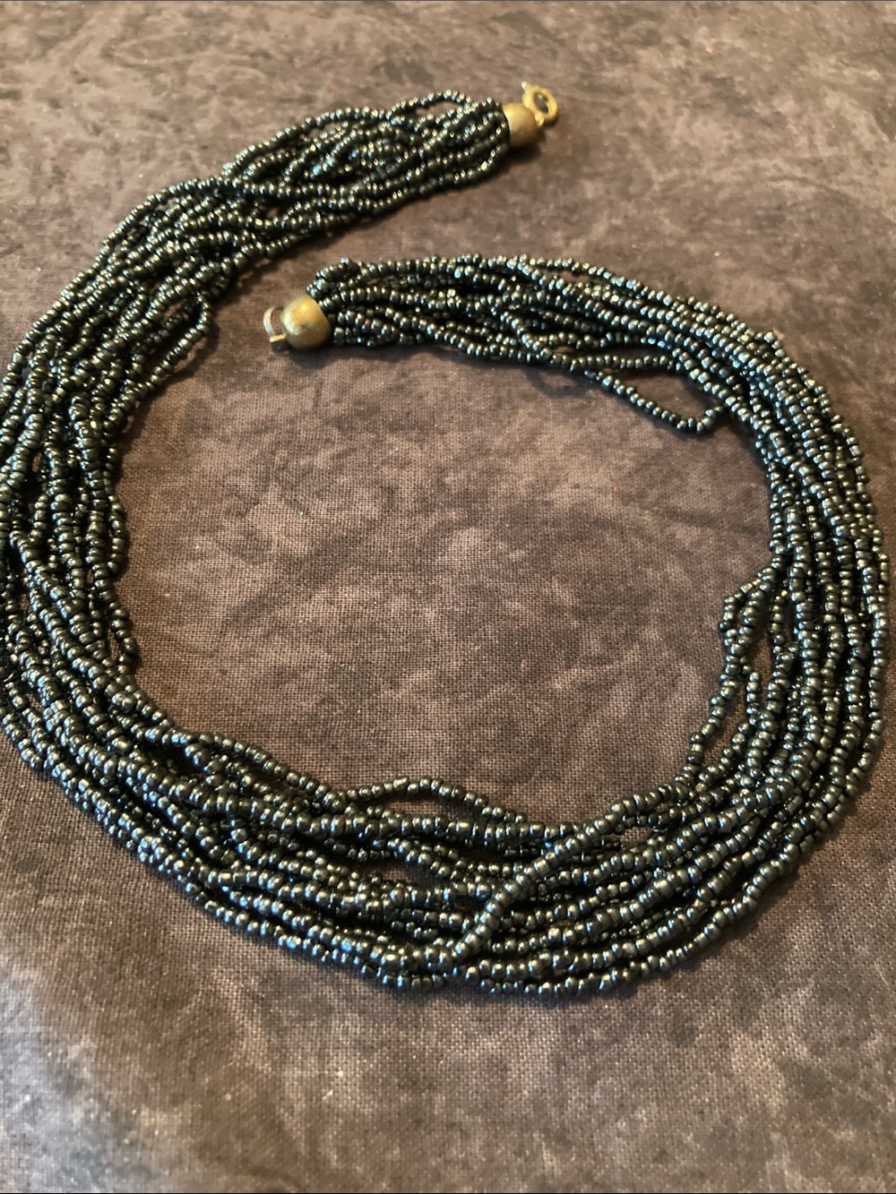 Multi-Strand Shimmering Black Seed Bead Necklace